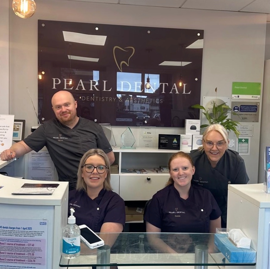 The reception team at the Pearl Dental front desk